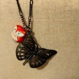 Owl and Butterfly necklace.